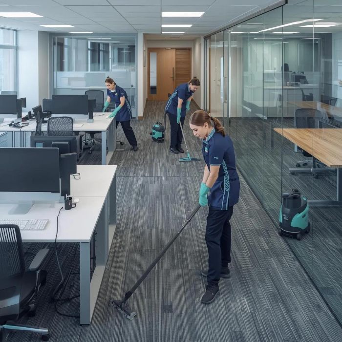 Cleaning crew working through a site office and crib room