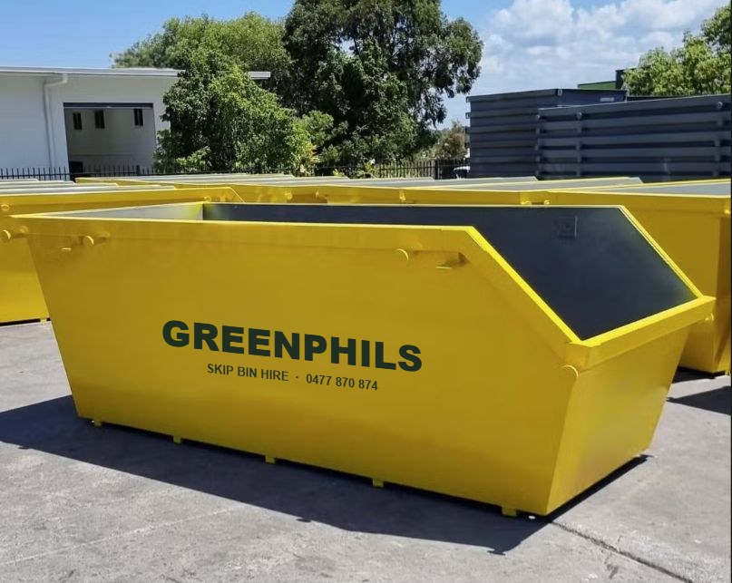 Yellow Greenphils-branded skip bin ready for delivery